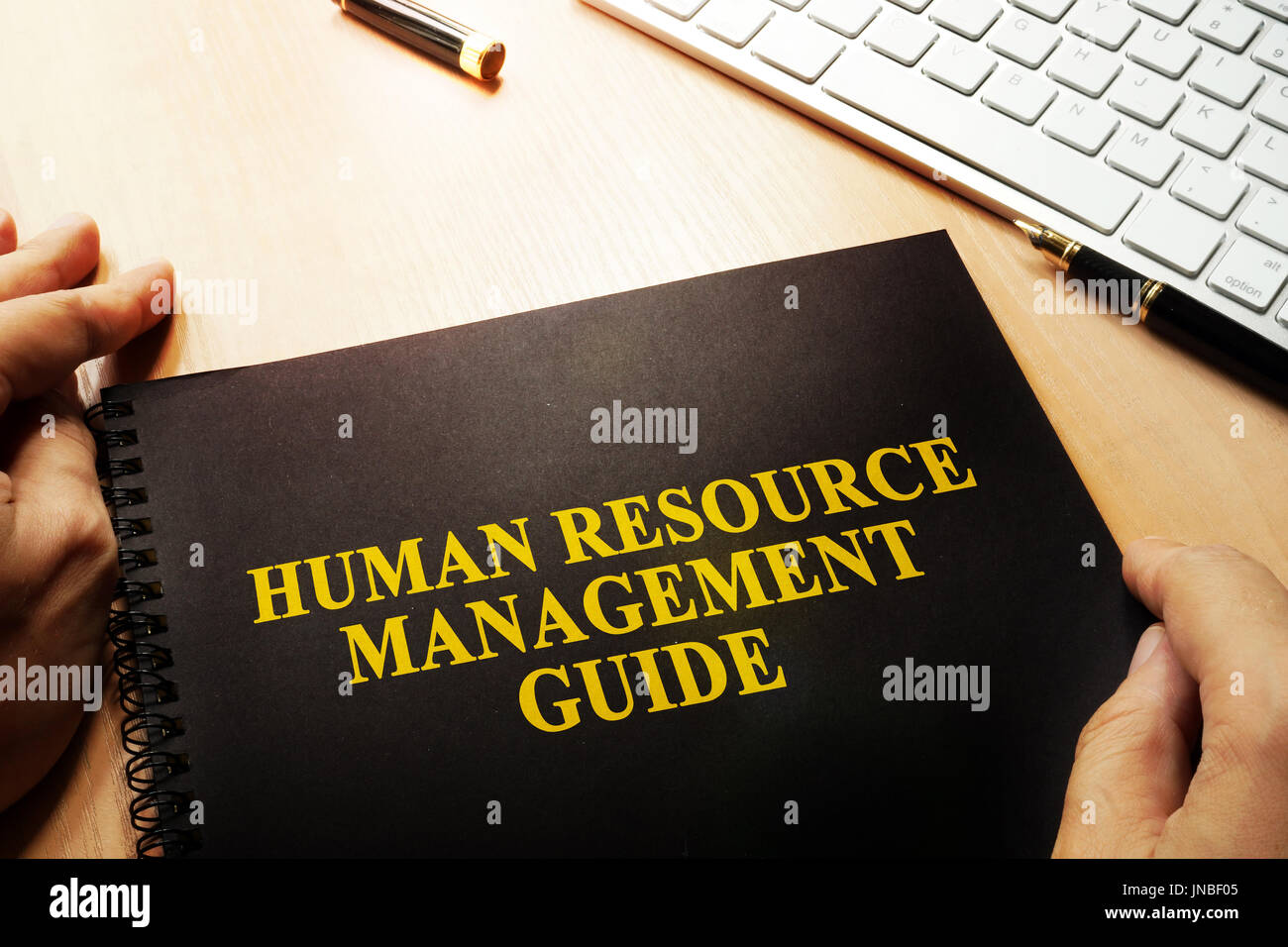 Human Resource Management Guide (HRM) concept. Stock Photo