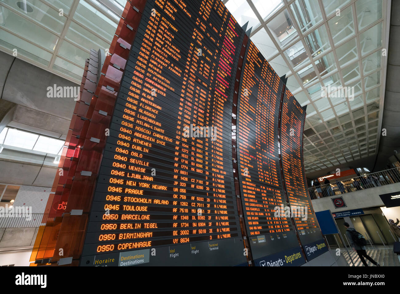 Screens with flight schedules at Charles de Gaulle airport in Paris Stock Photo