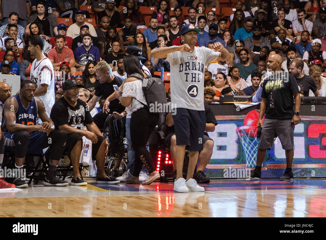 Head coach Allen Iverson 3's Company roots his team from sidelines while teammate Al Thornton watches from bench during Game #3 against 3 Headed Monsters Big3 Week 5 3-on-3 tournament UIC Pavilion July 23,2017 Chicago,Illinois. Stock Photo