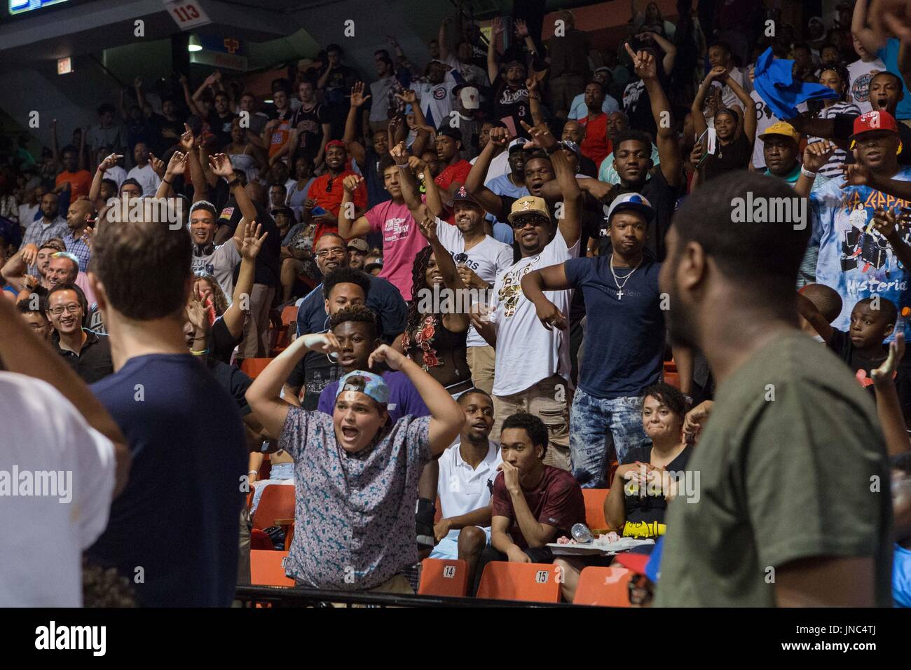 Fans rushing to volunteer for chance to win $5000 by successfully shooting basket into hoop 4-point line Big3 Week 5 3-on-3 tournament UIC Pavilion July 23,2017 Chicago,Illinois. Stock Photo