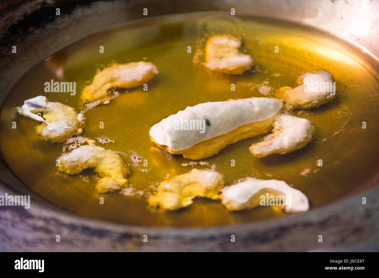 Deep frying shrimp and chili at Pez taquaria in Oaxaca, Mexico Stock Photo