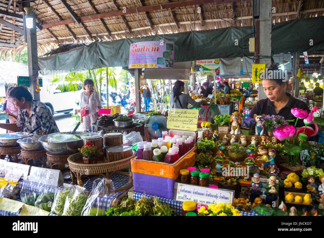 Vendors at stalls selling food at Khlong Lat Mayom Floating Market, Bangkok Thailand Stock Photo