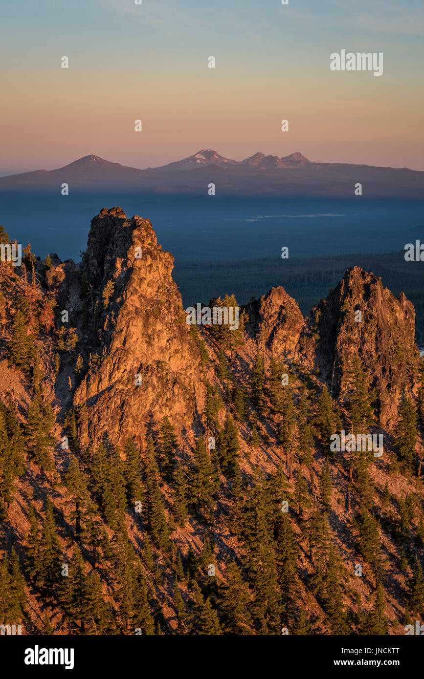 View from Paulina Peak at Newberry National Volcanic Monument in Central Oregon. In the distance: (l to r) Mount Bachelor, South Sister, Broken Top. Stock Photo