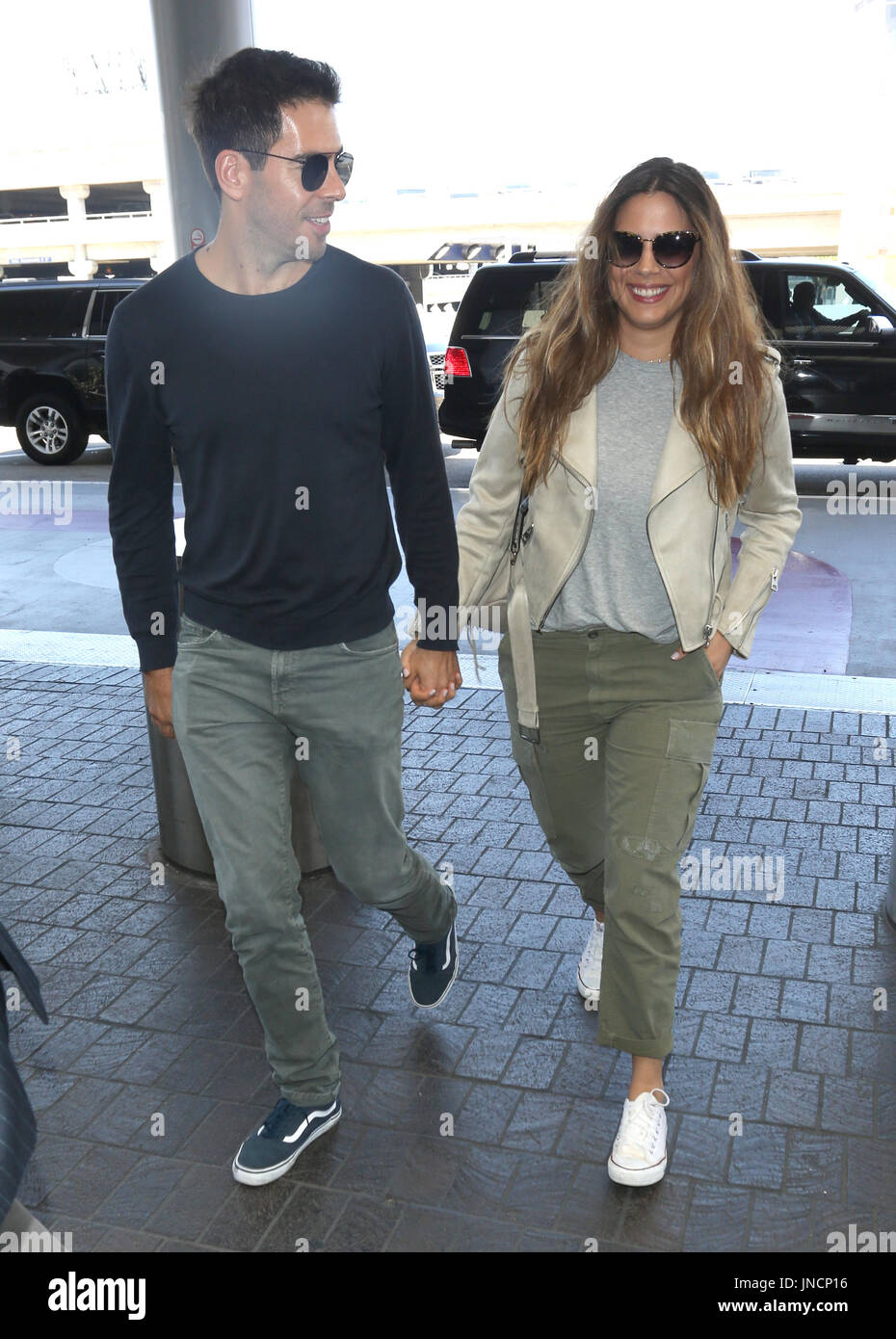 Eli Roth and his wife Lorenza Izzo arrive at Los Angeles International ...