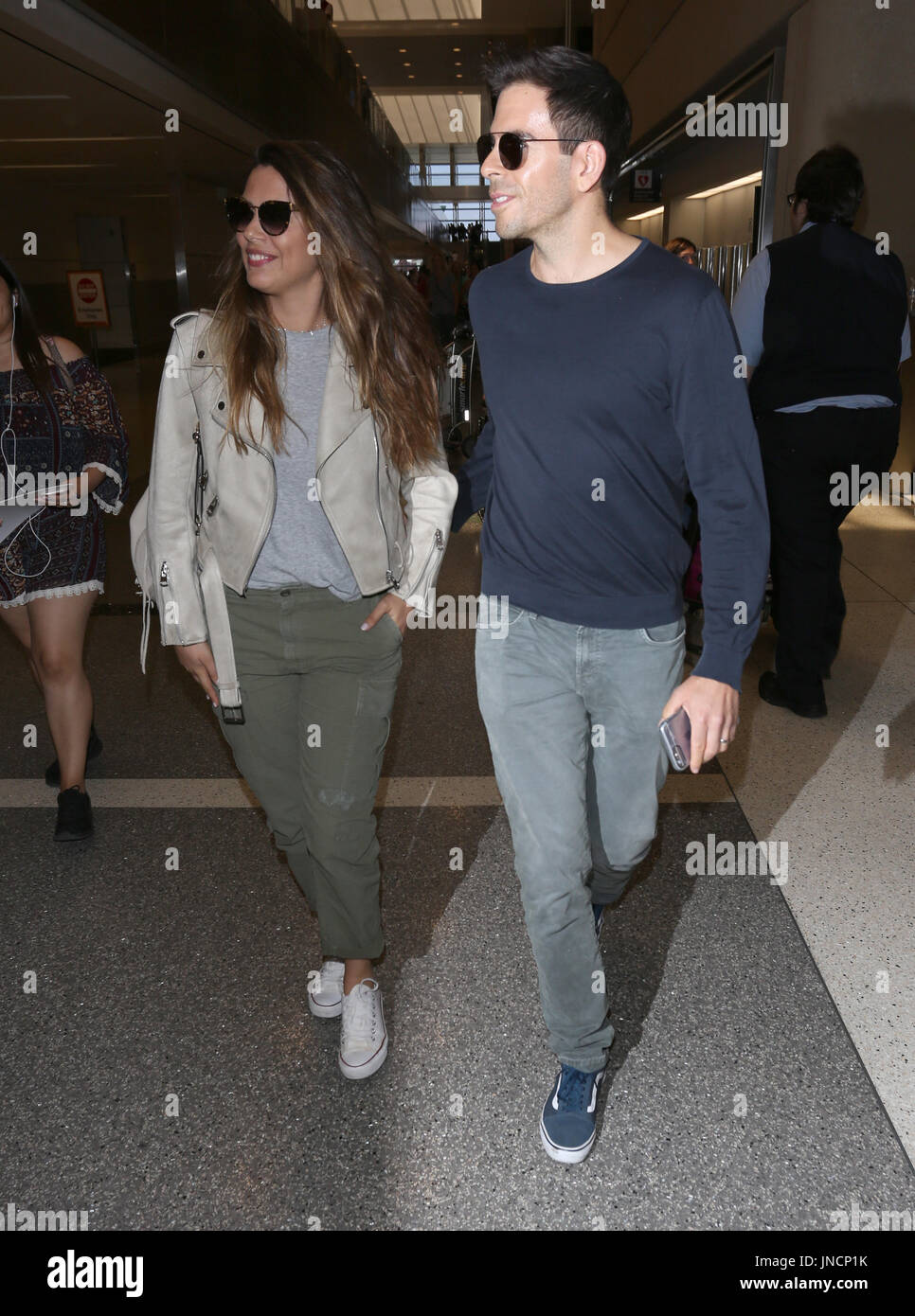 Eli Roth and his wife Lorenza Izzo arrive at Los Angeles International ...