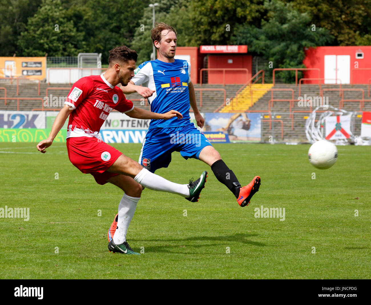 sports,football,Regional League West,2017/2018,Rot Weiss Oberhausen vs SV Westfalia Rhynern 2:1,Stadium Niederrhein in Oberhausen,scene of the match,Enes Topal (RWO) left and Mathieu Bengsch (Rhynern) Stock Photo