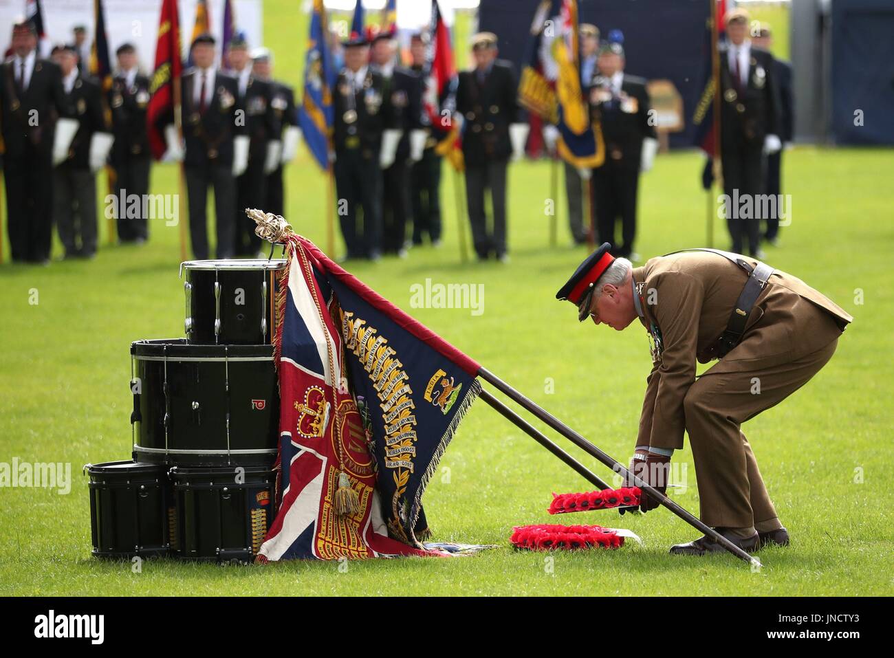 Governor of Edinburgh Castle Major General Mike Riddell-Webster lays a wreath by a drum altar during a parade and service in Crieff, Perthshire, to mark the 100-year commemoration of the Battle of Passchendaele. Stock Photo
