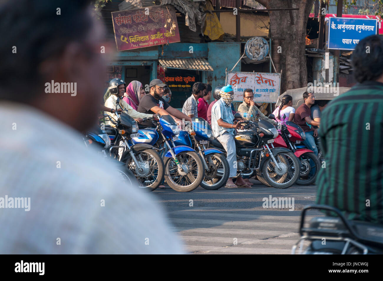 Traffic motorbikes mopeds in Pune, Maharashtra, India Stock Photo