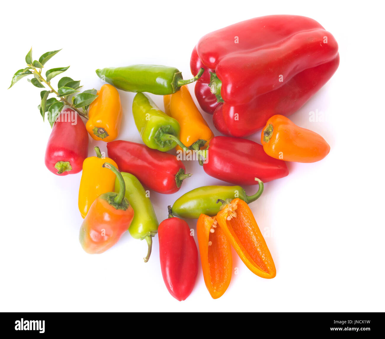 colorful sweet pepper in front of white background Stock Photo - Alamy