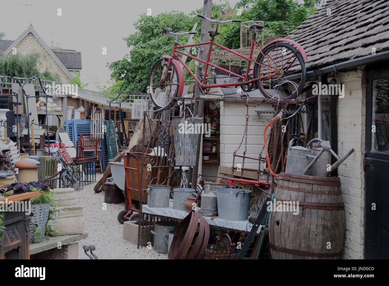 Untidy hoarders yard, Lechlade on Thames, Gloucestershire, England, UK, GL7 3DL Stock Photo