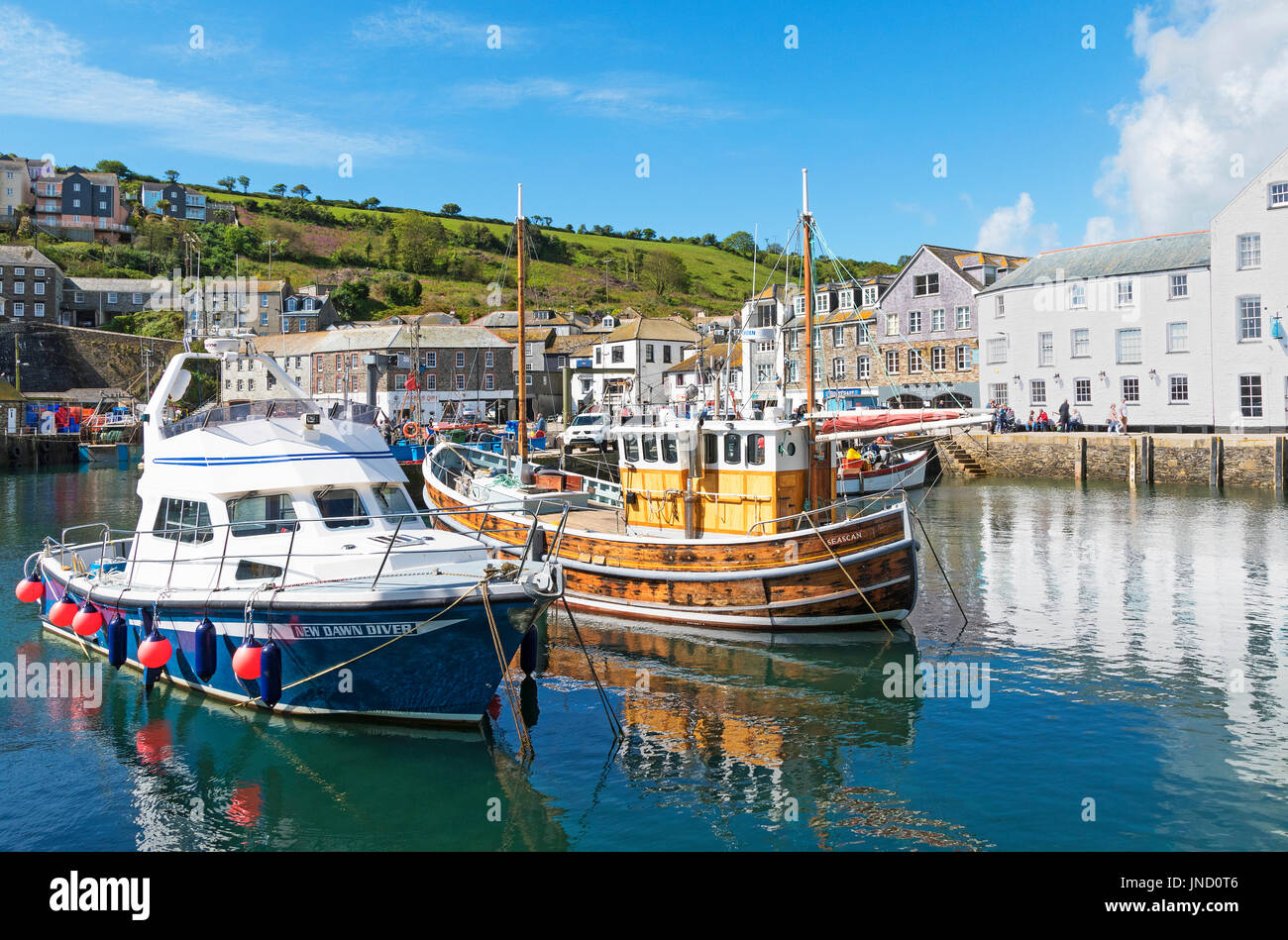 fishing boats in the harbour at mevagissey, cornwall, england, britain, uk. Stock Photo