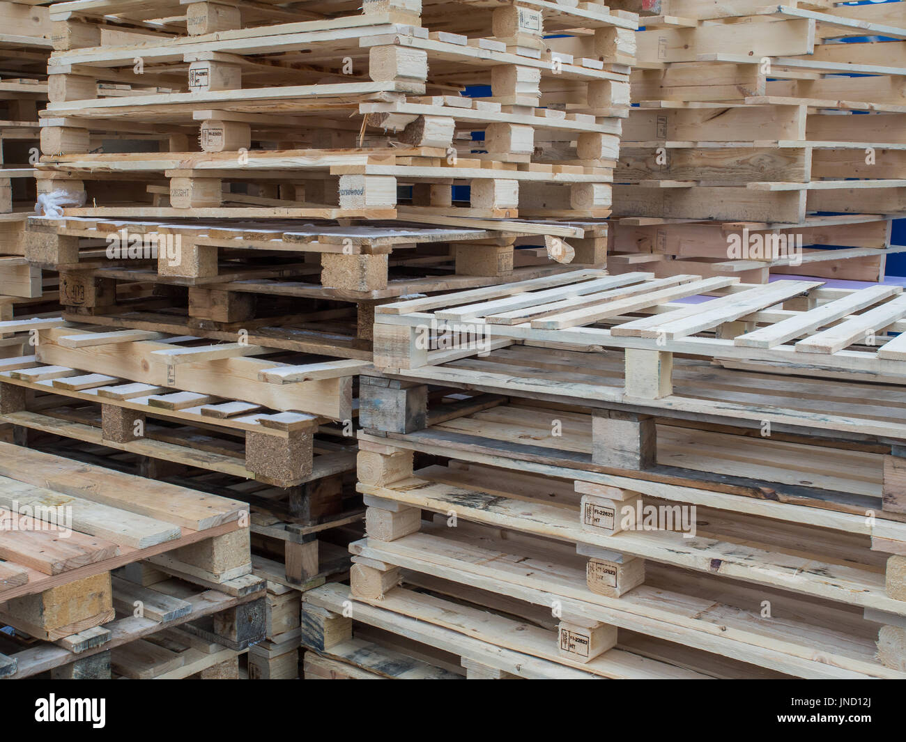 Wooden euro pallets lying in a stack Stock Photo Alamy