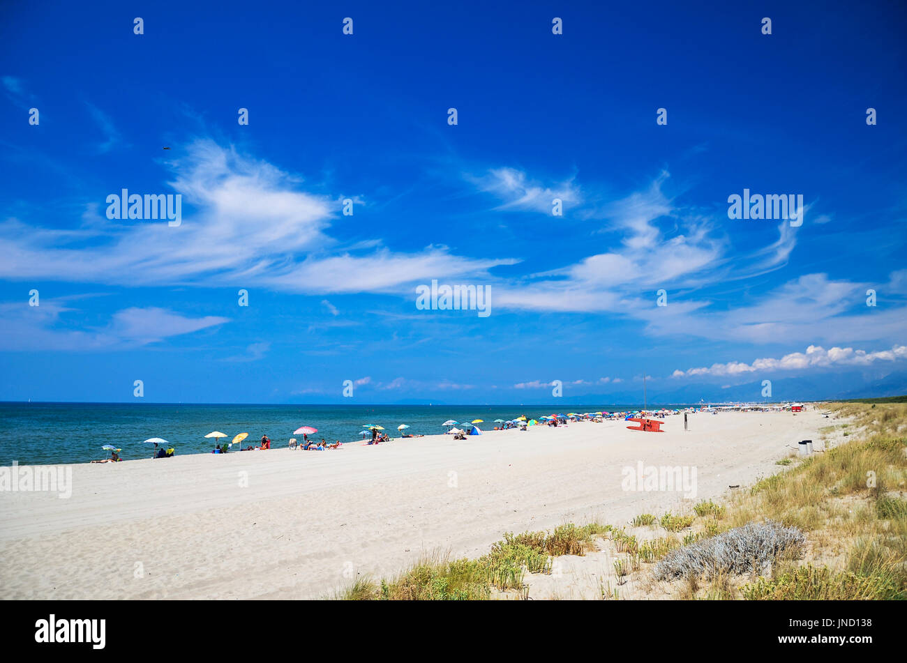 Picturesque view on Italian sandy beach Marina di Vecchiano nearby Pisa,  Tuscany in Italy Stock Photo - Alamy