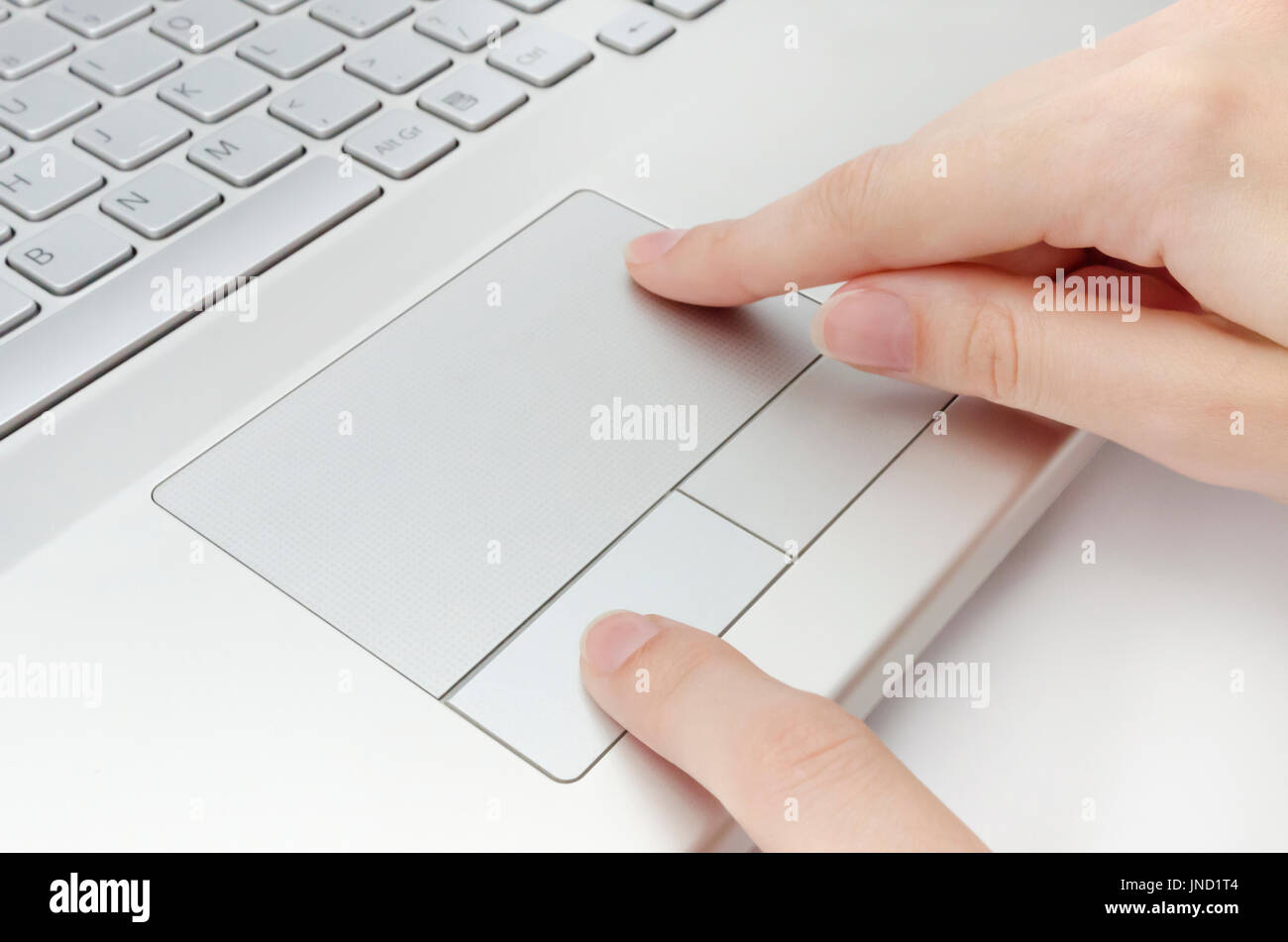 Human fingers working on laptop touchpad Stock Photo Alamy