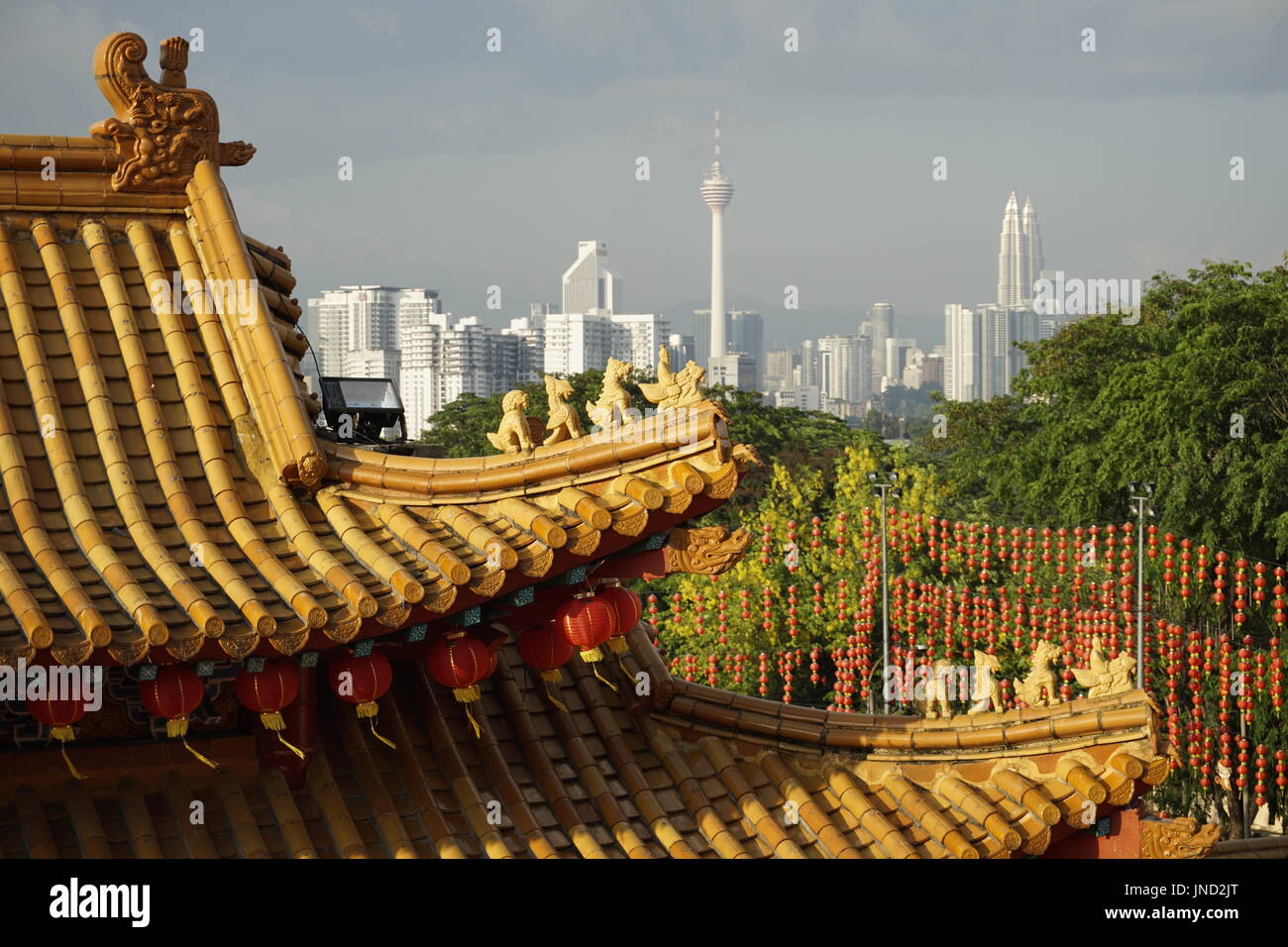 Thean Hou temple in Kuala Lumpur, Malaysia with Kuala Lumpur skyline in the background with Petronas Twin Towers and KL Tower Stock Photo