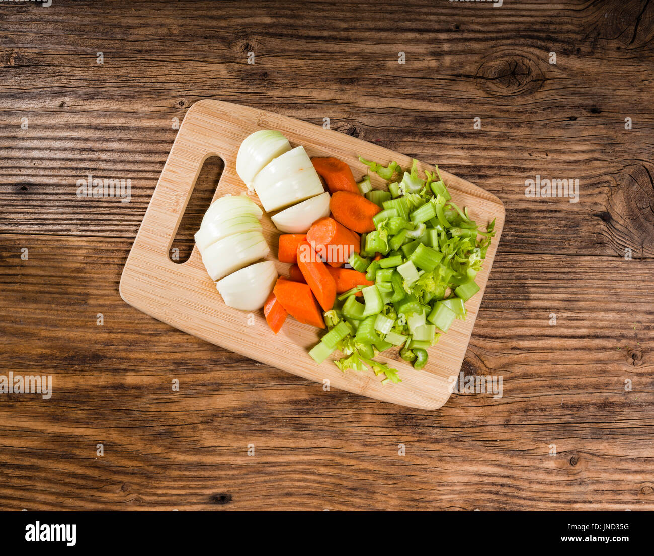 Vegetable Mirepoix Of Carrots Celery And Onions On A Cutting Board Stock Photo Alamy