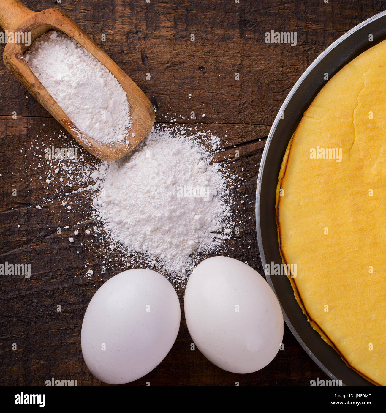 Cooking crepioca pancake of cassava (tapioca) glutenfree on wooden
