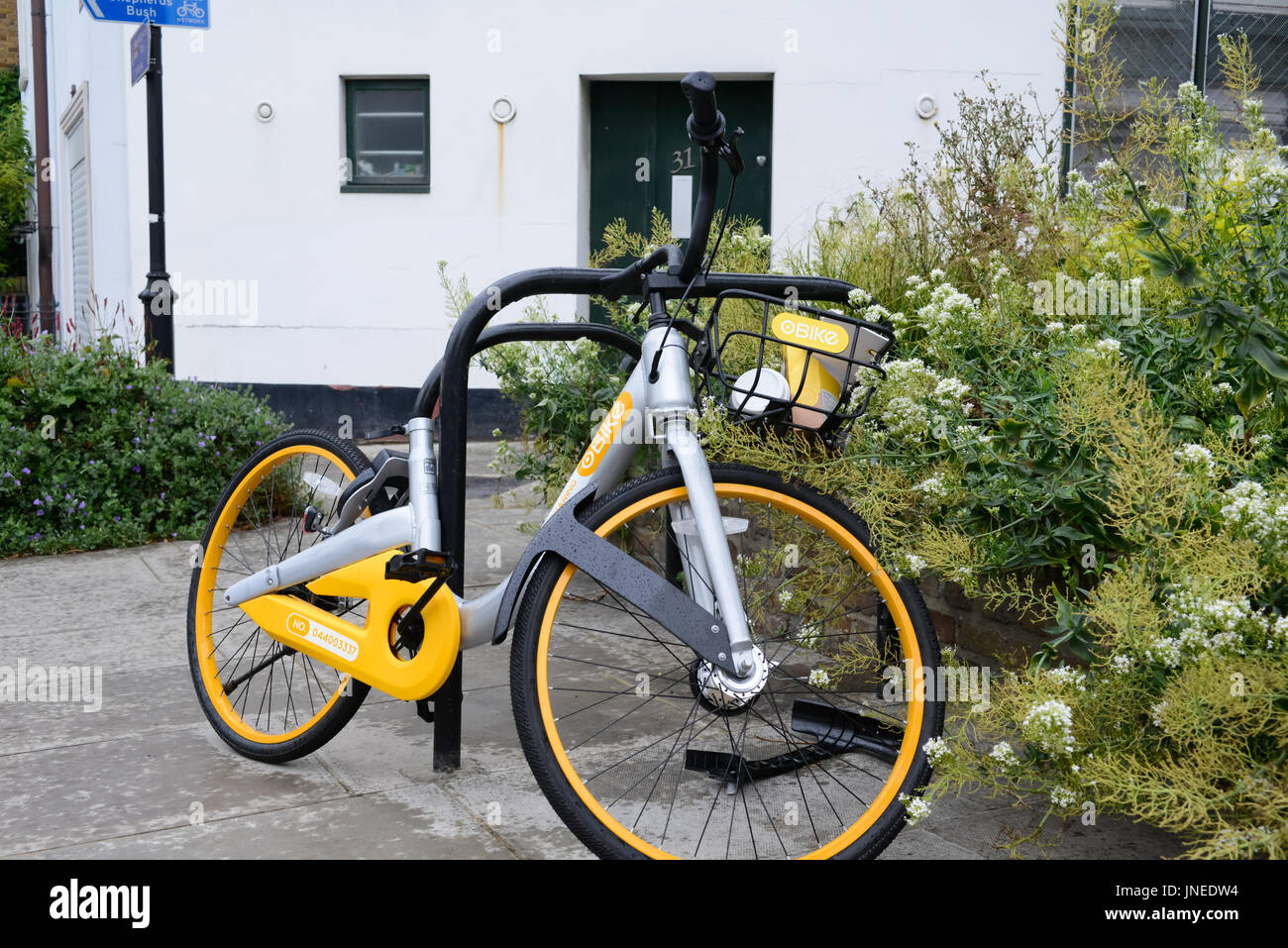 London, UK. 29th July, 2017. A damaged oBike found in Pottery Lane in  London. The bike basket is full of rubbish, the seat is missing, and there  is rubbish in the basket.