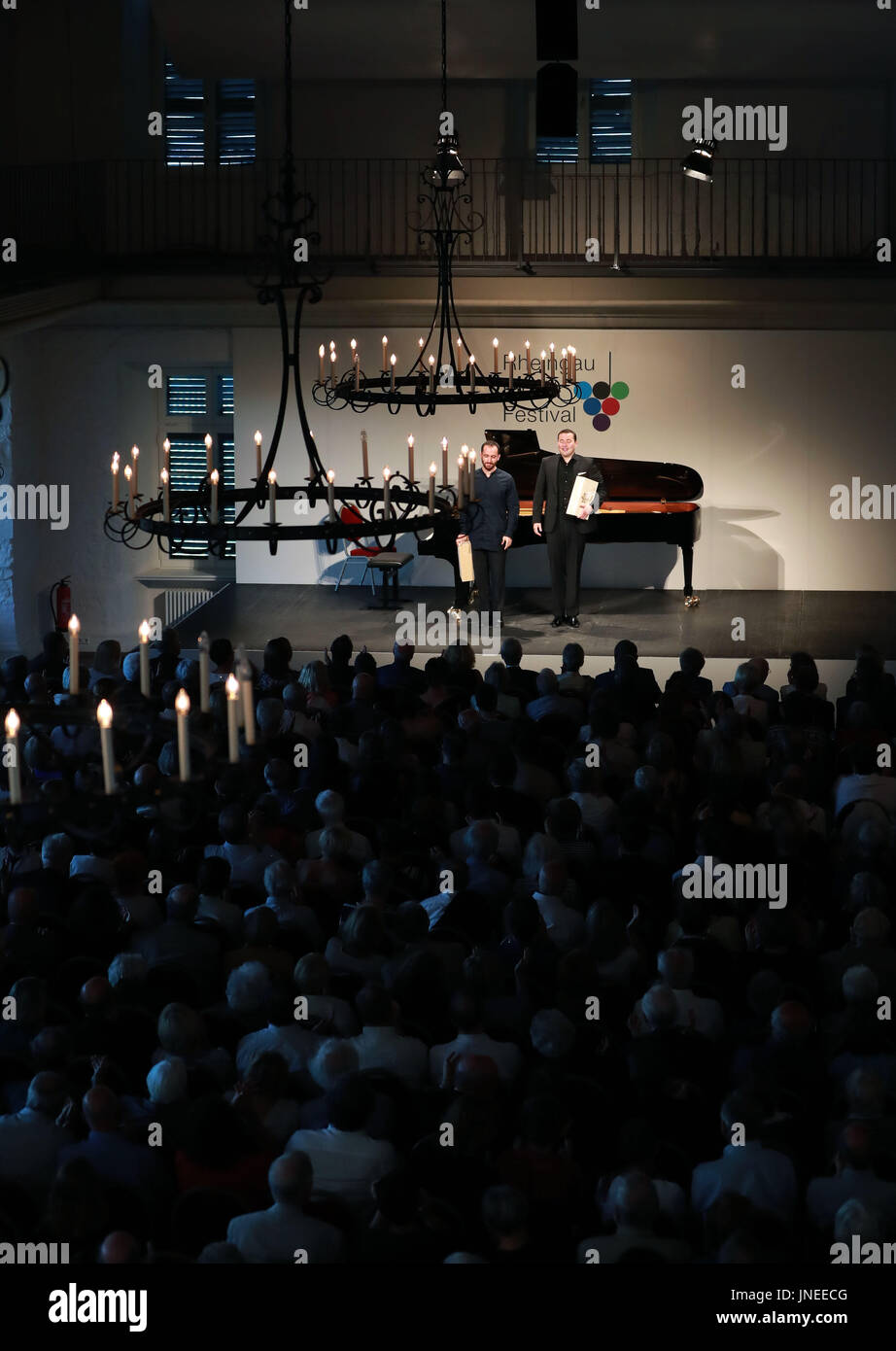 (170730) -- GEISENHEIM (GERMANY), July 30, 2017 (Xinhua) -- Pianist Igor Levit (L) and tenor Simon Bode perform at the 30th Rheingau Music Festival at the Schloss Johannisberg in Geisenheim, Germany, July 29, 2017. (Xinhua/Luo Huanhuan) (zw) Stock Photo