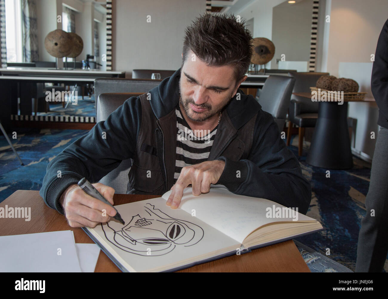 Managua, Nicaragua. 28th July, 2017. dpatop - Colombian pop singer Juanes, photographed during an interview on the occasion of his Latin America tour in Managua, Nicaragua, 28 July 2017. Juanes, known for his song 'La Camisa Negra', is very worried about the dramatic situation of the people in Venezuela and the escalation of violence. Photo: Miguel Alvarez/dpa/Alamy Live News Stock Photo