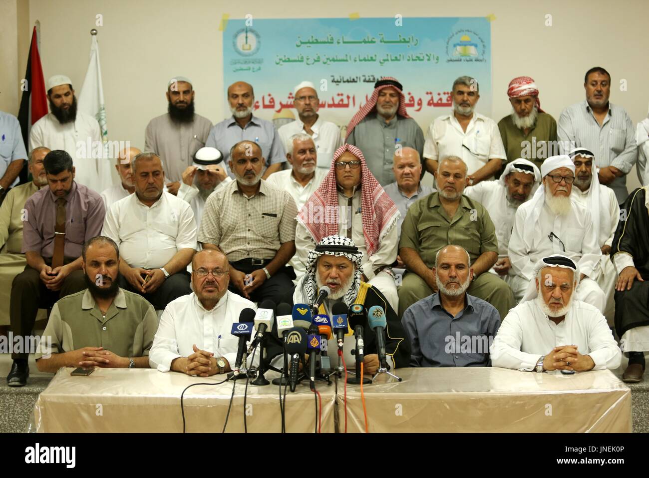 Gaza City, Gaza Strip, Palestinian Territory. 30th July, 2017. Marwan Abu Ras, a head of the Palestine Scholars Association, speaks during a press conference to show solidarity with Palestinians in Jerusalem, in Gaza city on July 30, 2017 Credit: Ashraf Amra/APA Images/ZUMA Wire/Alamy Live News Stock Photo