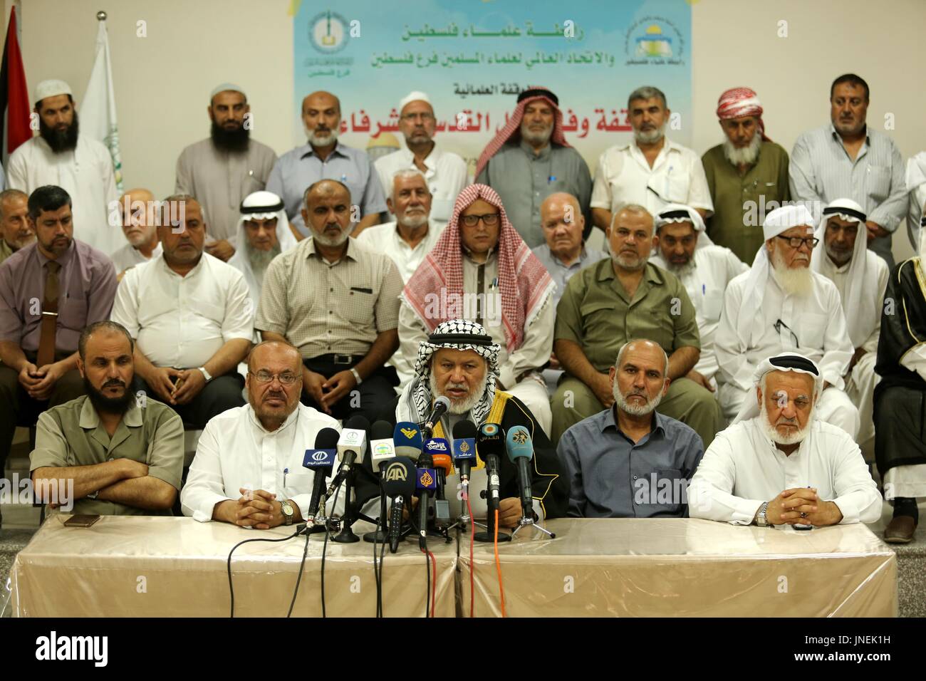 Gaza City, Gaza Strip, Palestinian Territory. 30th July, 2017. Marwan Abu Ras, a head of the Palestine Scholars Association, speaks during a press conference to show solidarity with Palestinians in Jerusalem, in Gaza city on July 30, 2017 Credit: Ashraf Amra/APA Images/ZUMA Wire/Alamy Live News Stock Photo