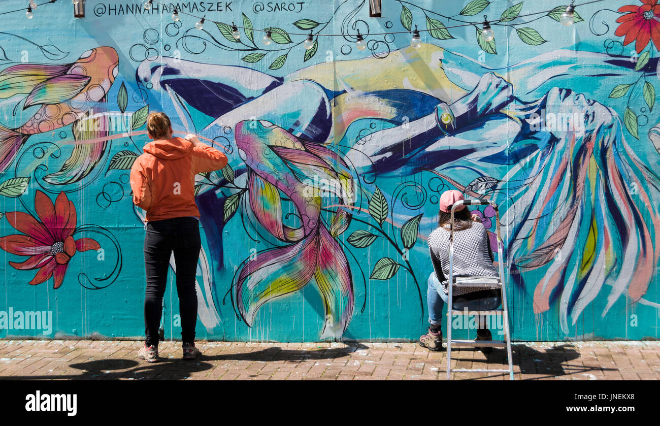 Bristol, UK. 30th July, 2017. UPFEST, the urban paint festival is underway in Bristol. It is Europe's largest street art festival, attracting over 300 artists from all over the world and large crowds attend to watch the pieces being painted. 30th July 2017 Credit: Carolyn Eaton/Alamy Live News Stock Photo