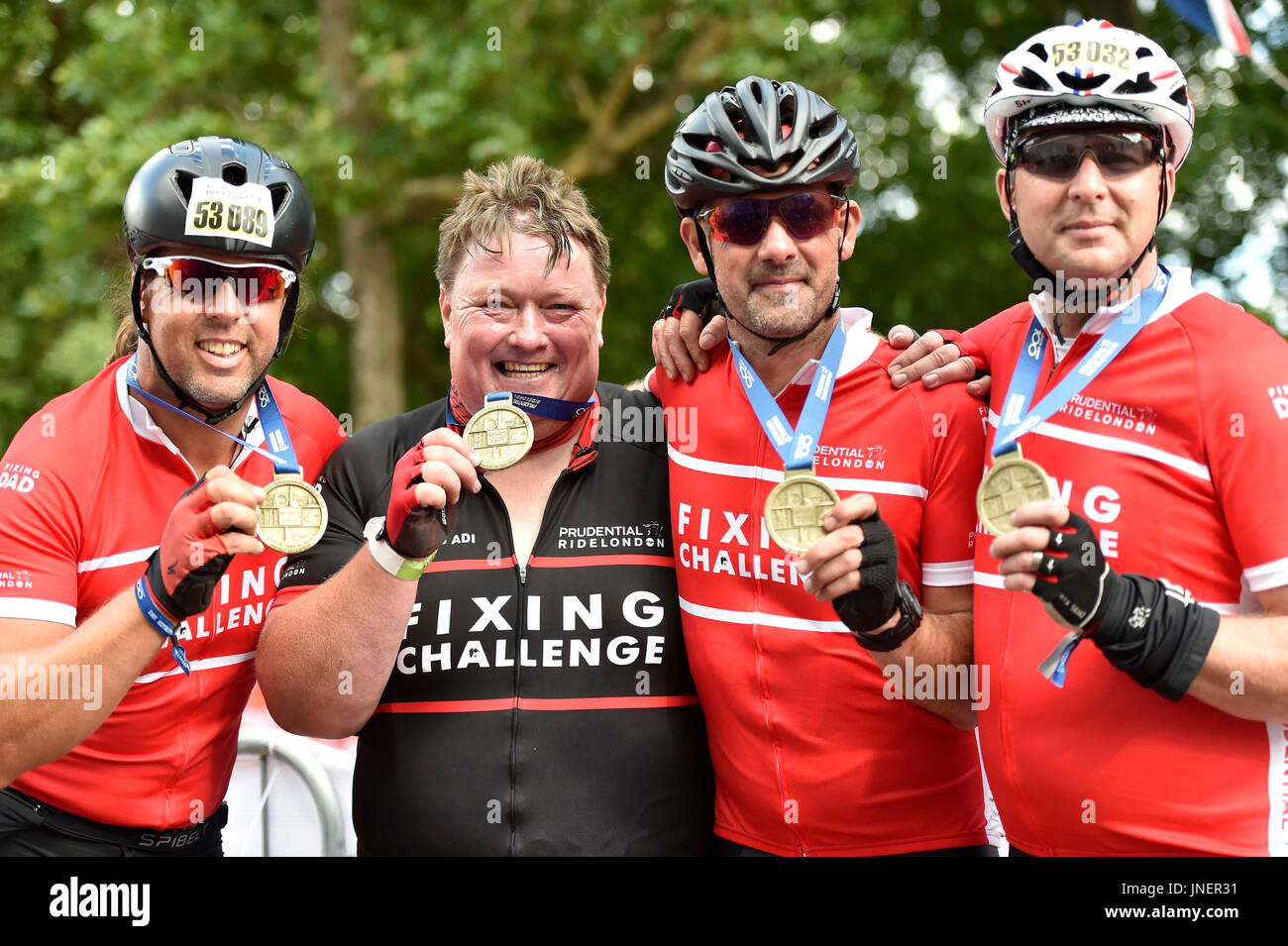 London, UK. 30th July, 2017. Fixing Dad - Adi (Adrian HIGHAM, ADRIAN HIGHAM, 49, from Brookland, Kent: antiques dealer) and his Fixing Challenge team posed photo for the press after they completed tech 100 miles ride at Prudential RideLondon Classic on Sunday, July 30, 2017, LONDON ENGLAND: Photo : Taka G Wu Credit: Taka Wu/Alamy Live News Stock Photo