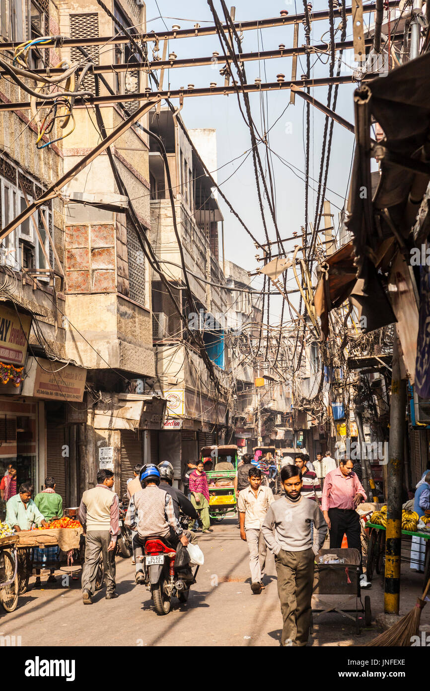 A street scene in Chandni Chowk, one of the oldest and busiest markets in Delhi, India. Stock Photo