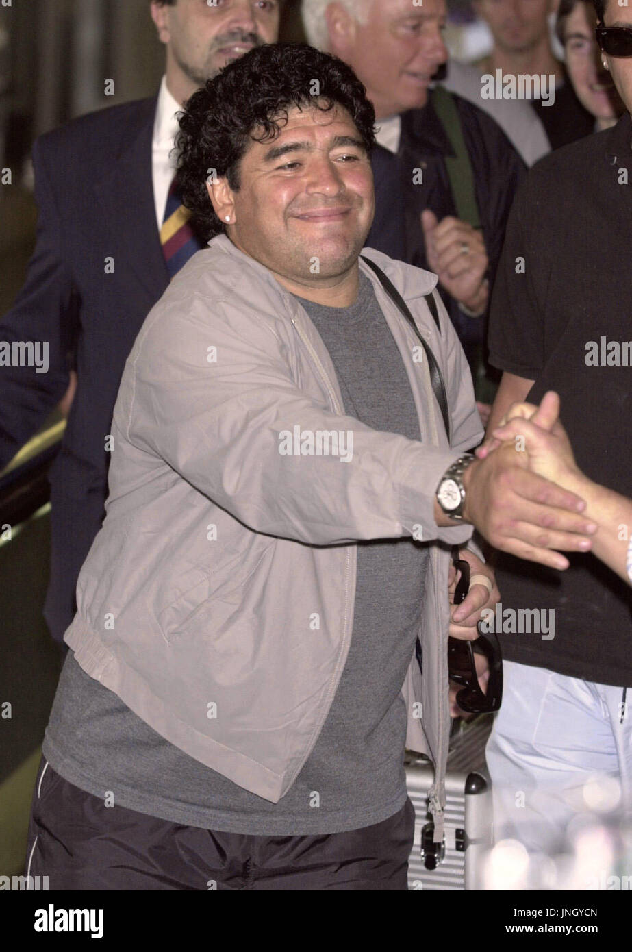 NARITA, Japan - Argentine soccer legend Diego Maradona shakes