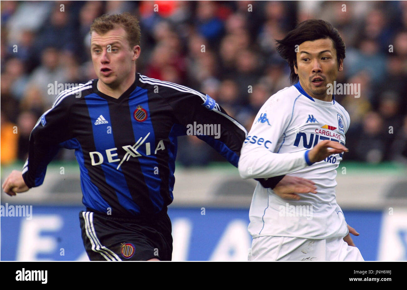 BRUGES, Belgium Japan striker Takayuki Suzuki (R) made his first full
