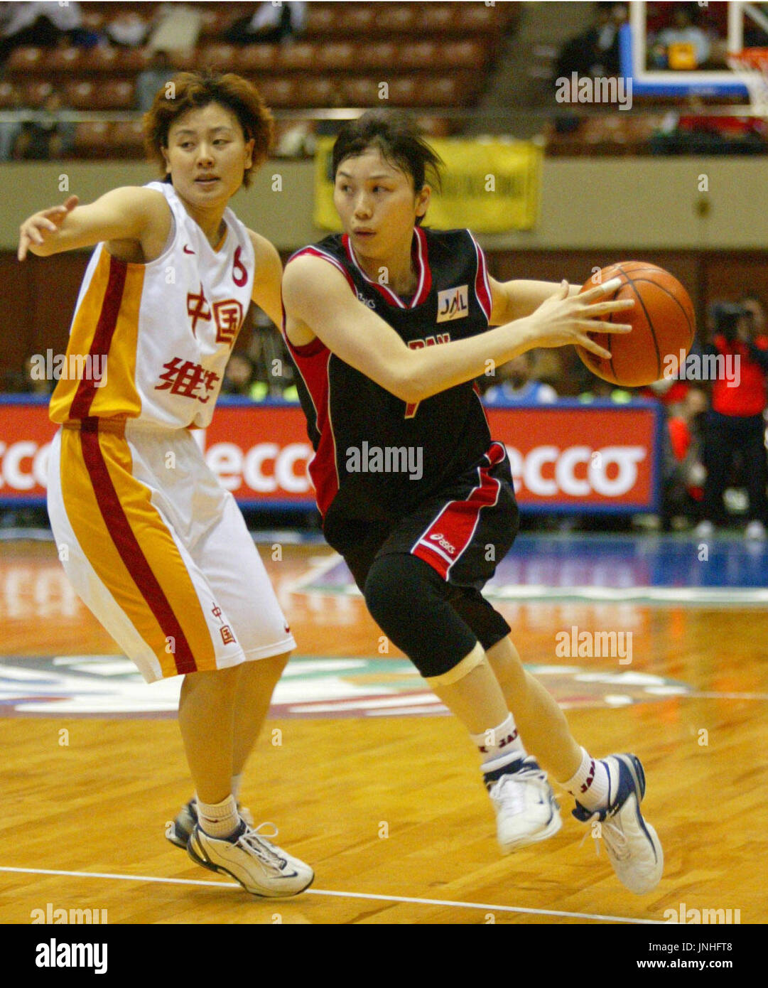 SENDAI, Japan Japan guard Natsumi Yabuuchi (R) ducks the defense of