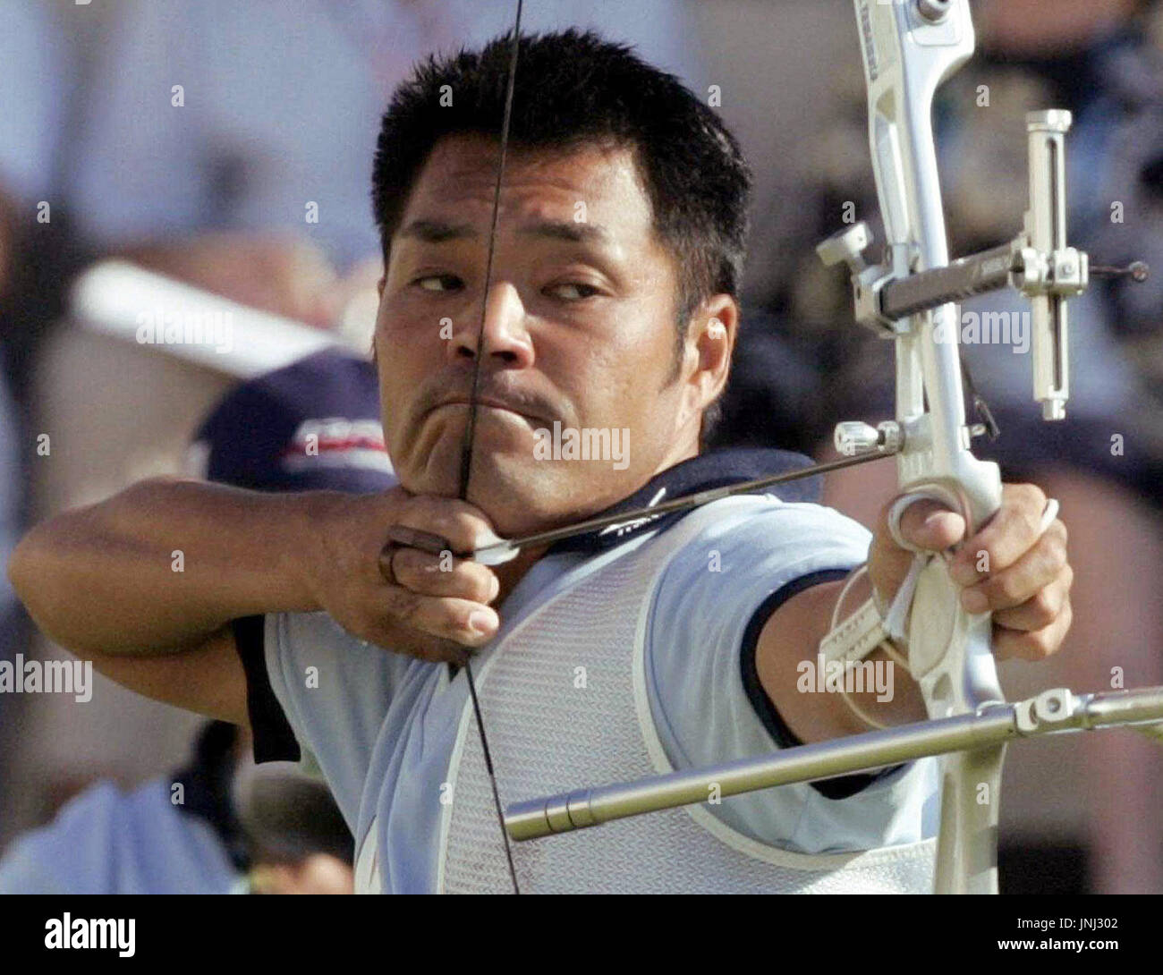 ATHENS, Greece - Japan's Hiroshi Yamamoto takes aim during the