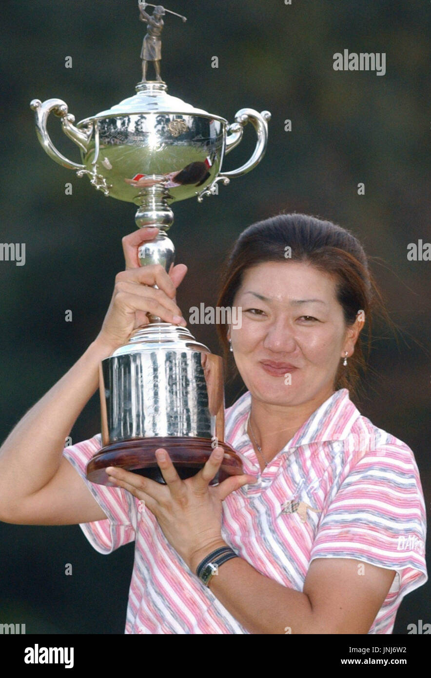 NODA, Japan Japan's Michiko Hattori raises the trophy after winning