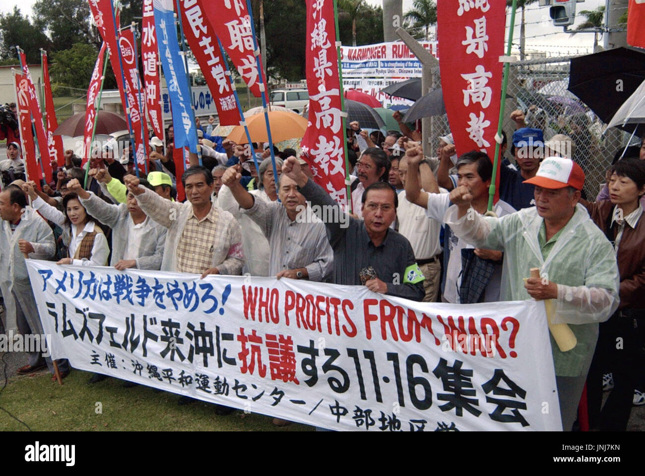 NAHA, Japan - People shout their protest at the visit to Okinawa of U.S ...