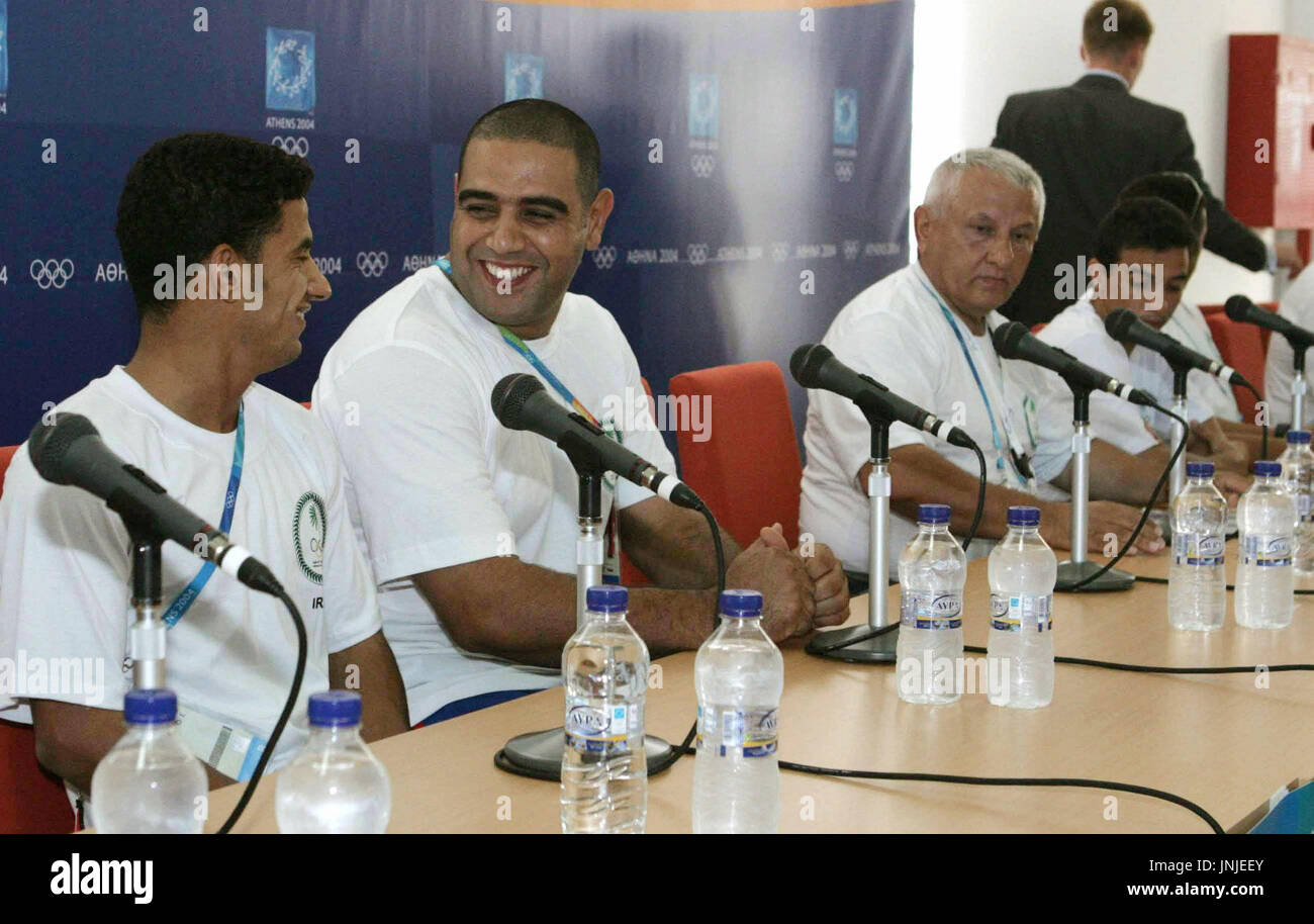 ATHENS, Greece - Members of the Iraqi team attend a news conference at Olympic village in Athens on Aug. 9. The 31 athletes, all making their Olympic debuts in Athens, either qualified or were invited by the International Olympic Committee and international sports federations. (Kyodo) Stock Photo