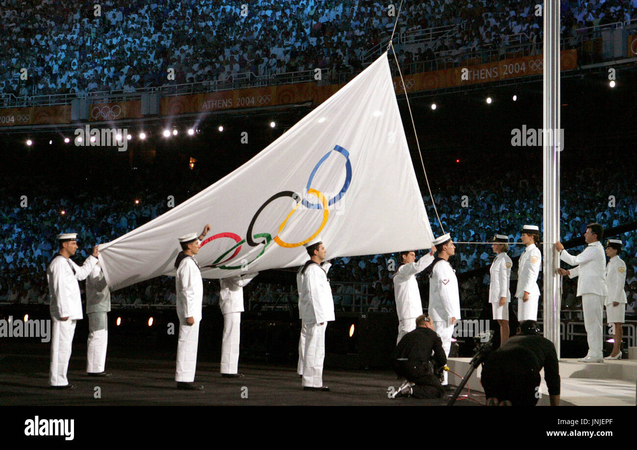 ATHENS, Greece - The Olympic flag is raised during the opening ceremony of  the Athens 2004 Olympic Games at Olympic Stadium on Aug. 13. (Kyodo Stock  Photo - Alamy