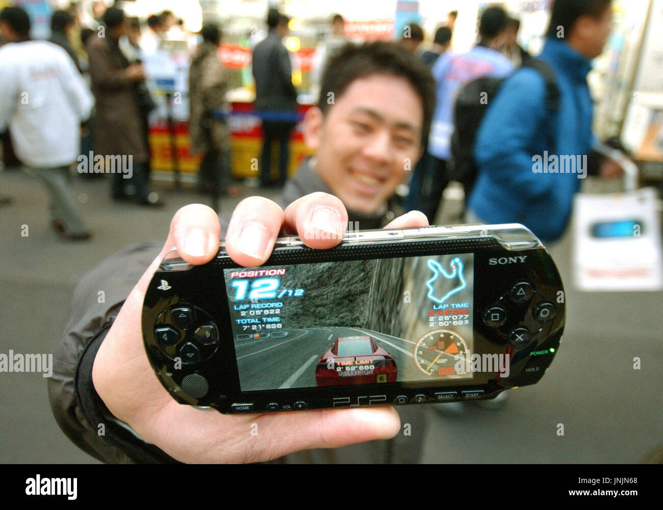 Sony PSP portable playstation with UMD disc Stock Photo - Alamy