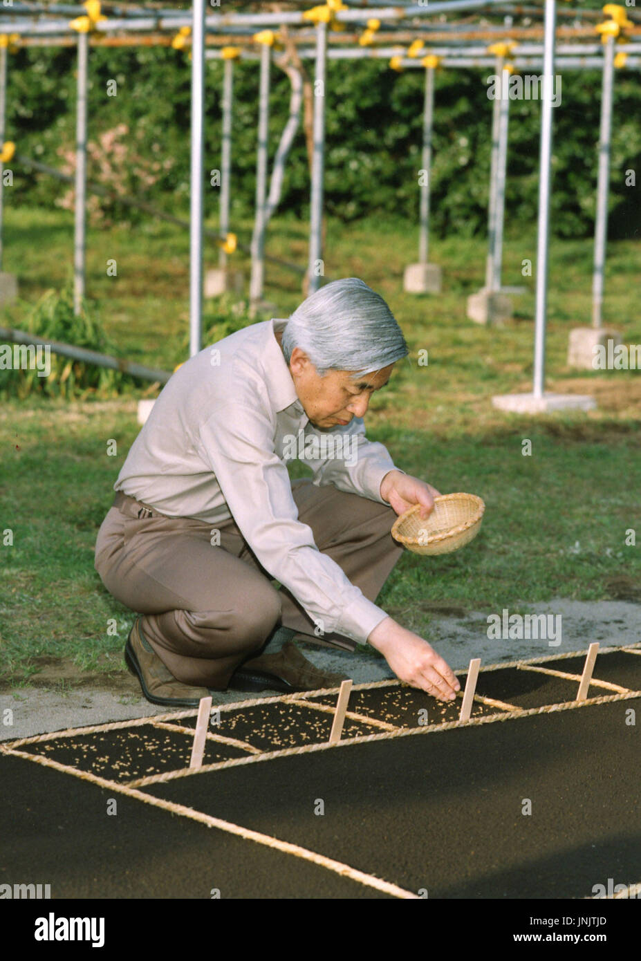 TOKYO, Japan Emperor Akihito seeds a rice nursery in the Imperial