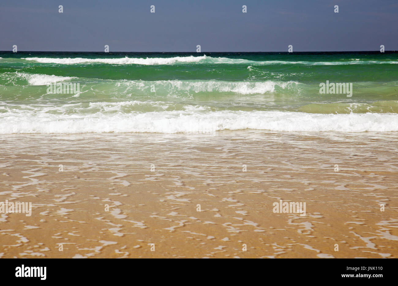 Dark beach foamy sea hi-res stock photography and images - Alamy