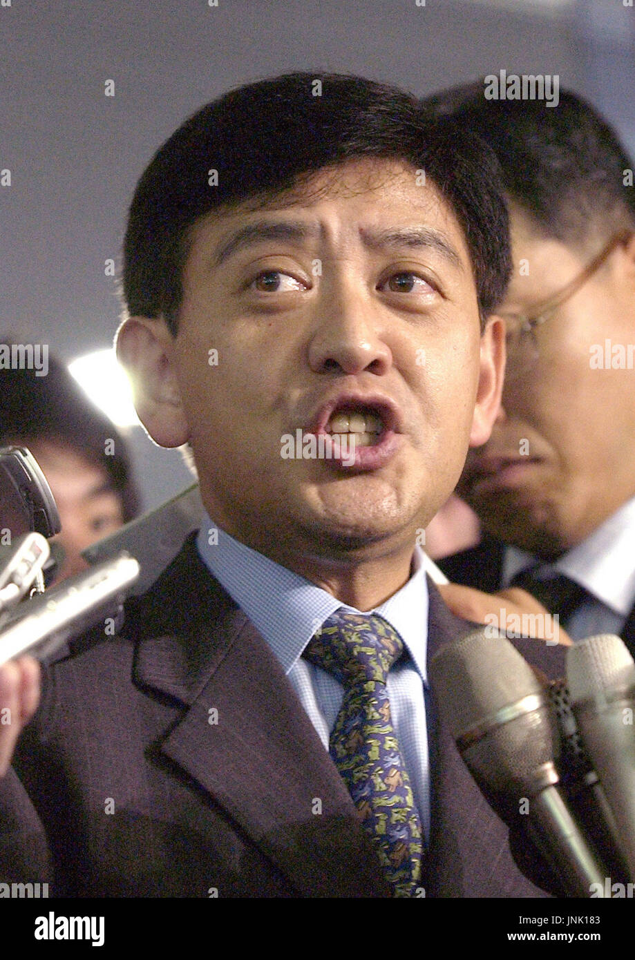 OSAKA, Japan - Financier Yoshiaki Murakami speaks to reporters after