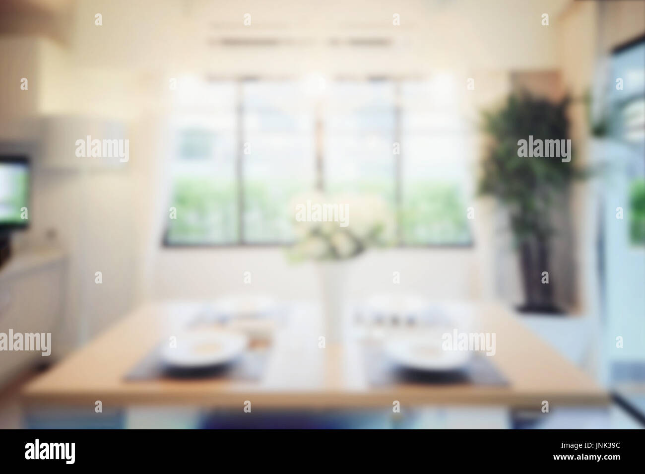 blur image of modern dining room interior Stock Photo - Alamy