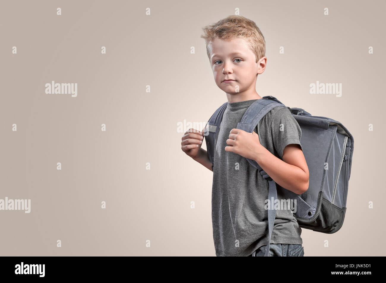 Back to shool concept, young boy with back bag isolated on white Stock ...