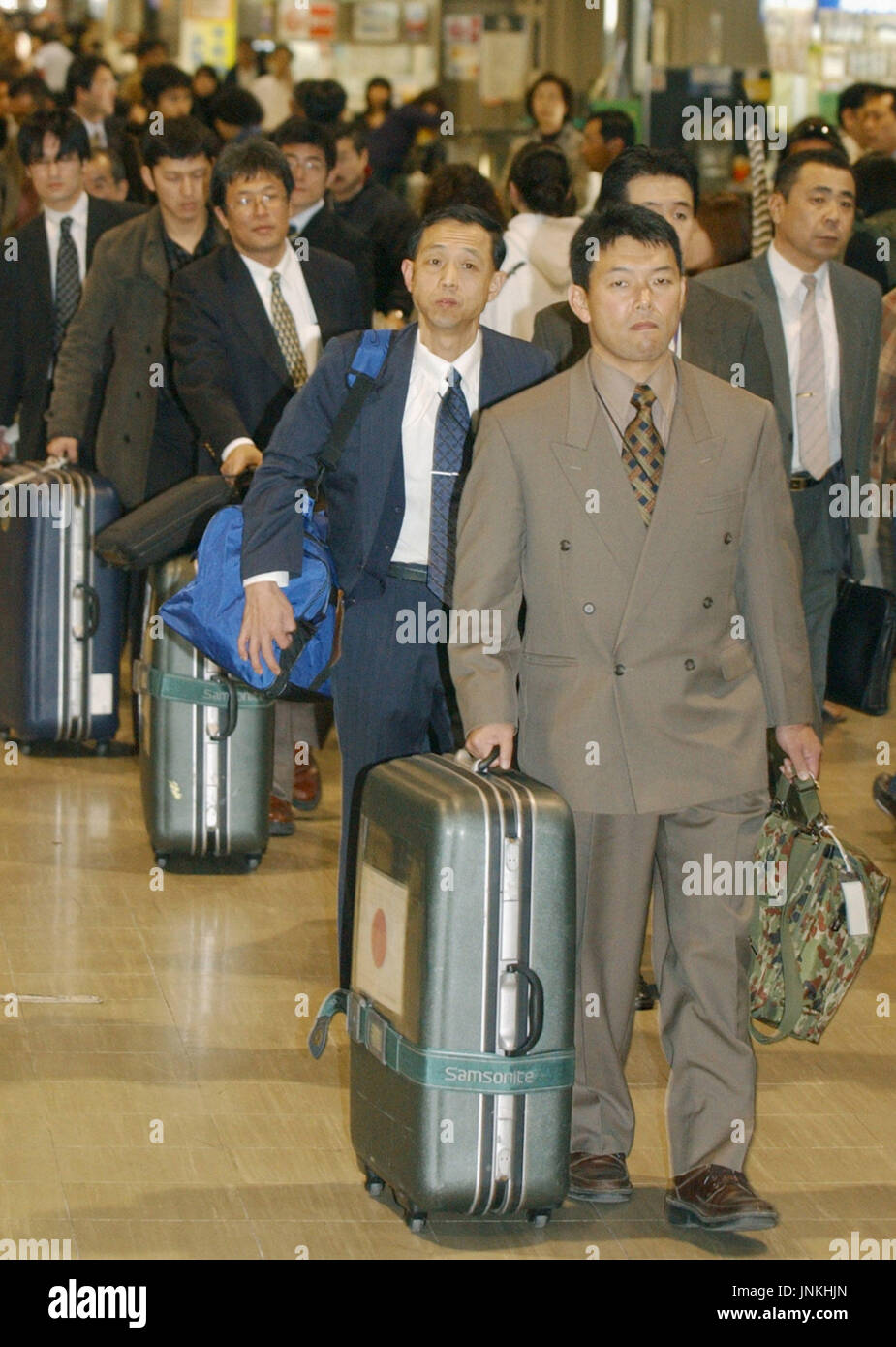 NARITA, Japan - Members of an advance team of Japan's Self-Defense ...