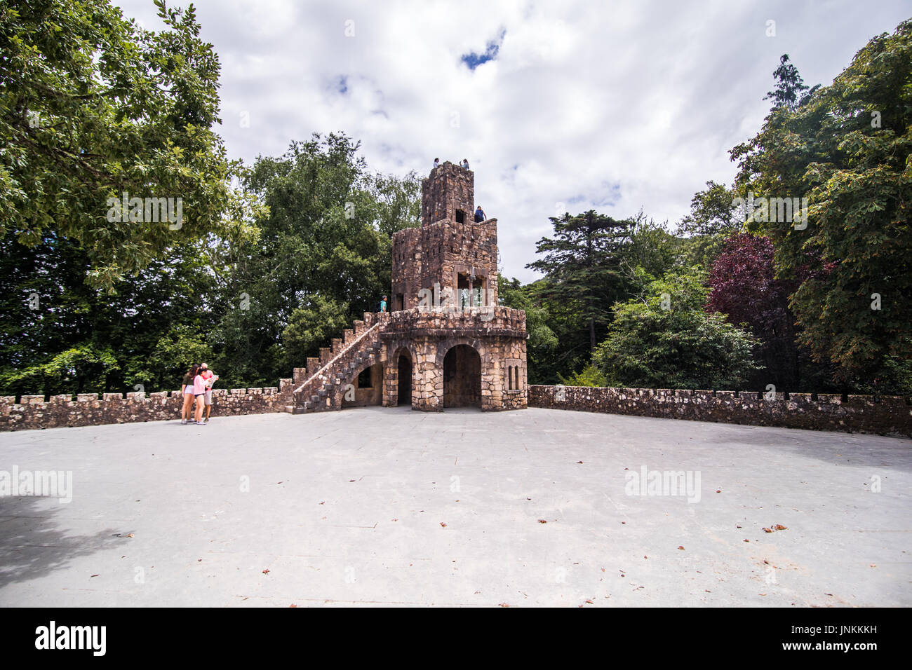 Portugal , Sintra . Palace Regaleira is typical Gothic architectural elements , such as turrets, gargoyles, and a tower in the shape of an octagon. Stock Photo