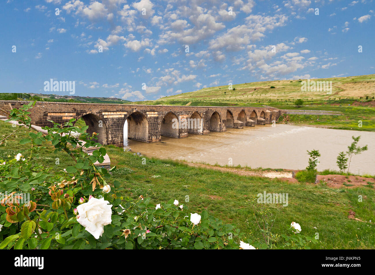 Ancient bridge known as Ongozlu Bridge, over the River Tigris in Diyarbakir, Turkey. Stock Photo