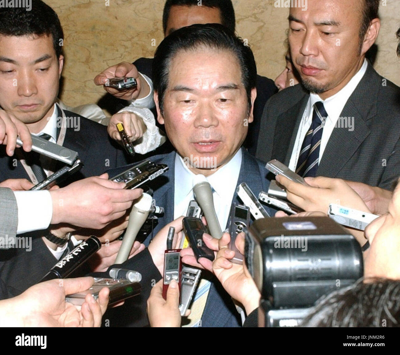 TOKYO, Japan Defense Agency chief Fukushiro Nukaga is surrounded by
