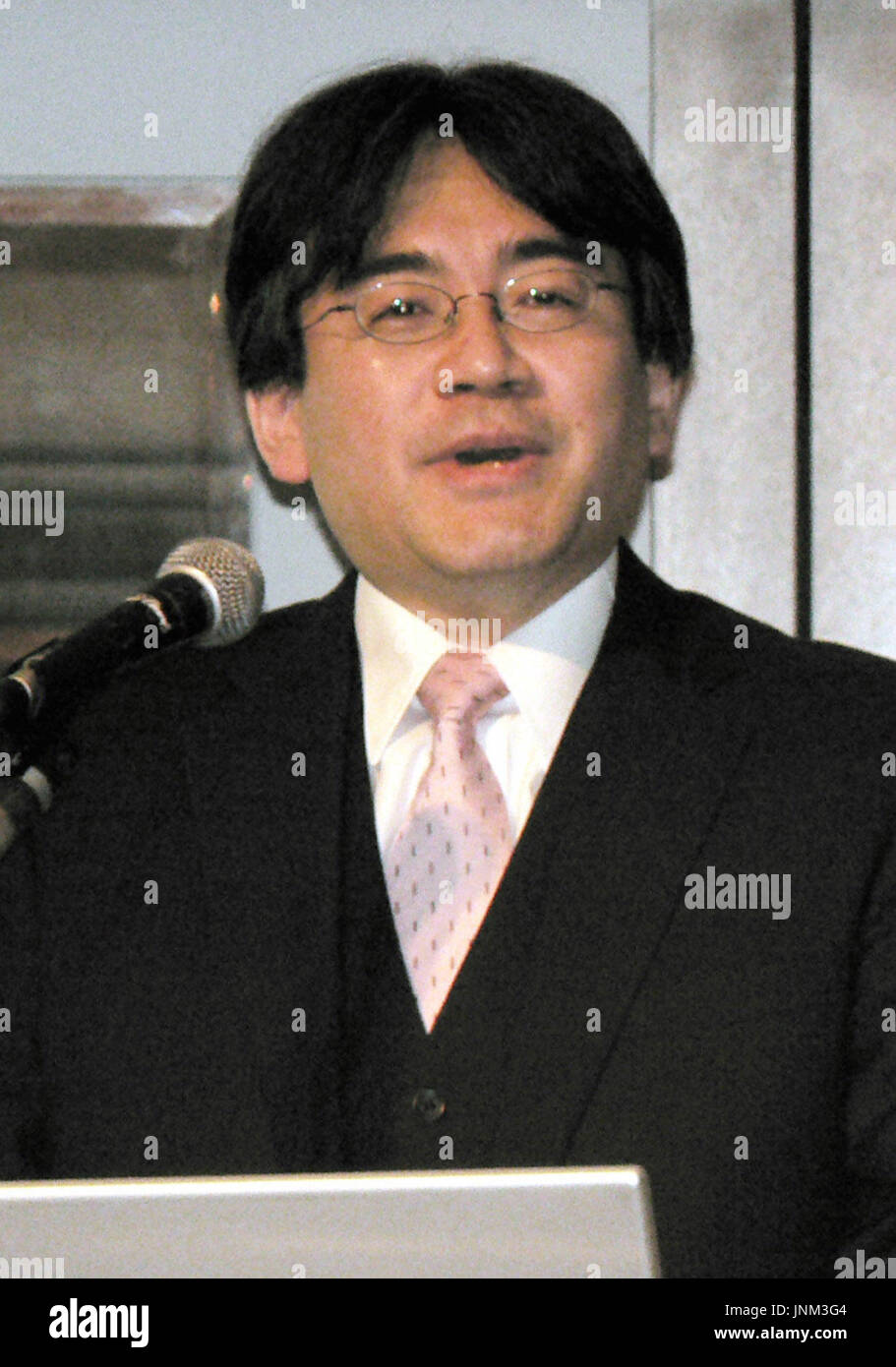 TOKYO, Japan - Satoru Iwata, president of Nintendo Co., speaks to reporters  at a Tokyo hotel on June 7. Iwata said that shipments of its hand-held  Nintendo DS game machine reached 8.4
