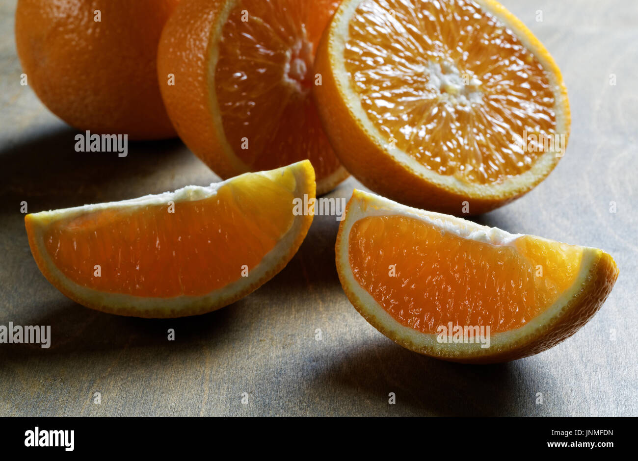 Orange slice close-up on the table Stock Photo