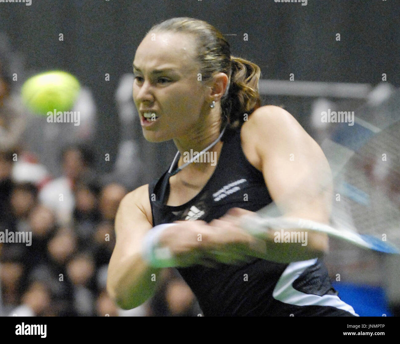 TOKYO, Japan - Swiss former world No. 1 Martina Hingis returns the ball TOKYO, Japan - Swiss former world No. 1 Martina Hingis returns the ball